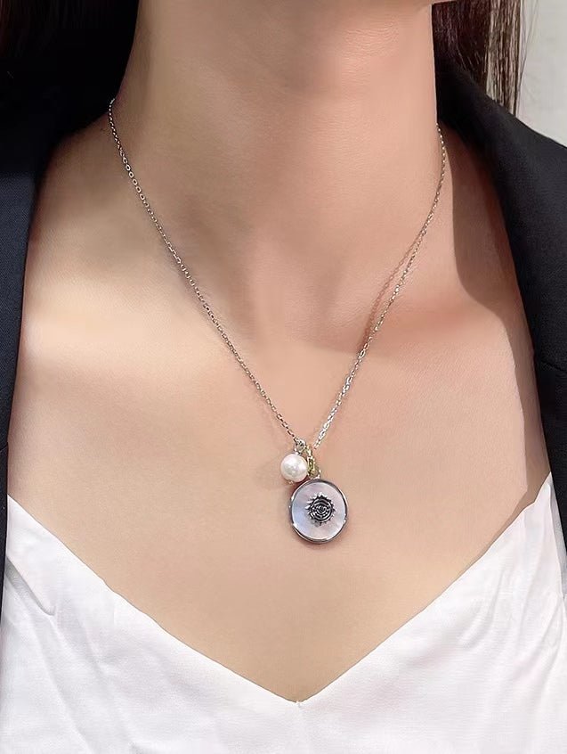 Collier en argent massif S925 avec véritable perle d'eau douce et œil de chance