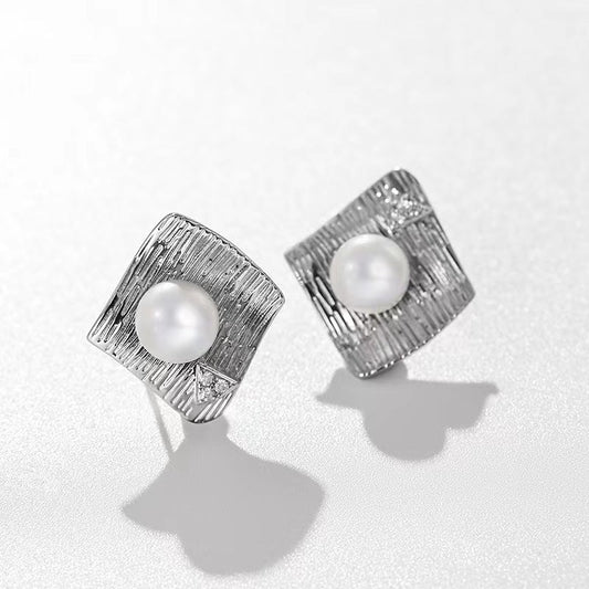 Pendientes de perlas de agua dulce genuinas con ondas de agua