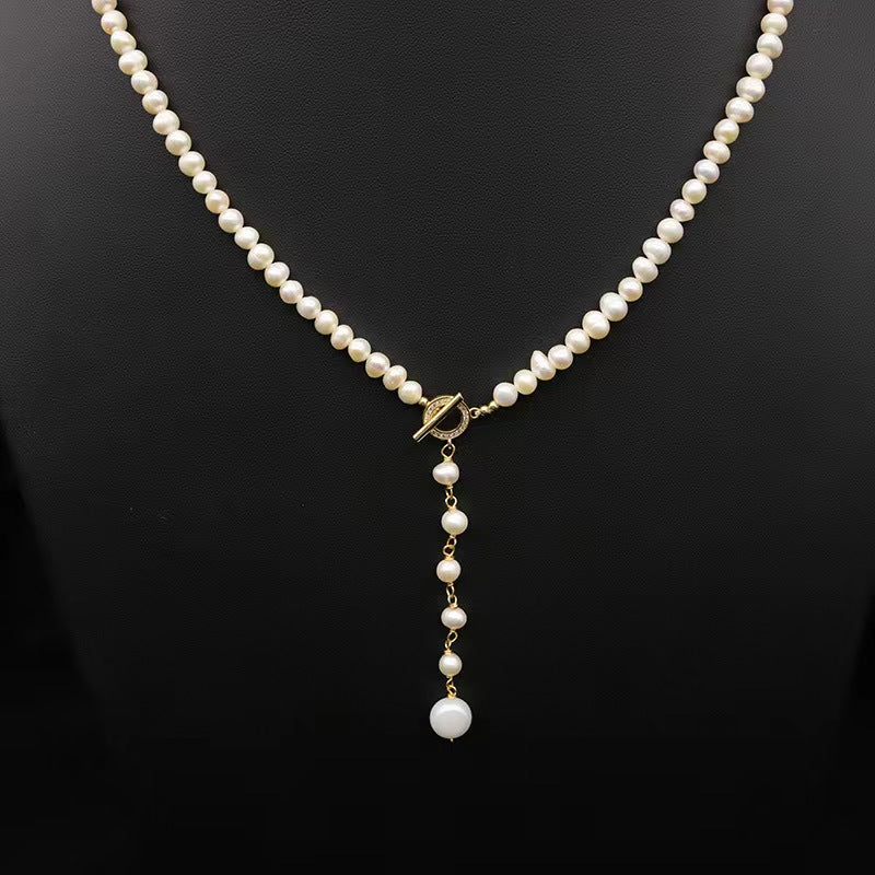 Collar Éblouissant de cola de elfo con perlas de agua dulce genuinas