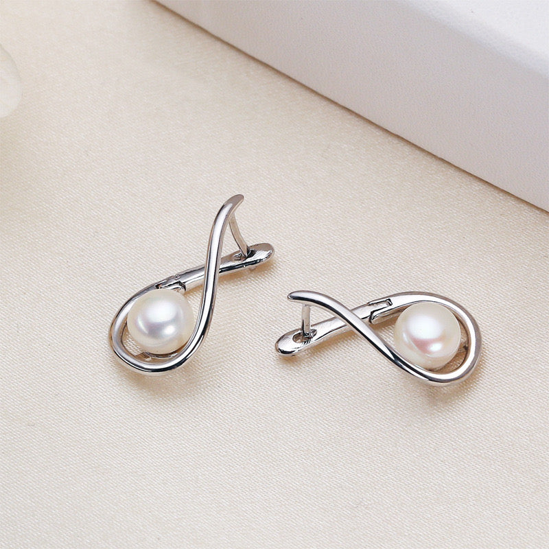 Boucles d'oreilles Eve en laiton plaqué or 18 carats et véritables perles d'eau douce