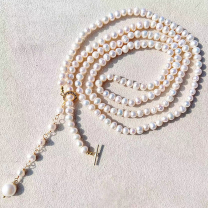Collar Éblouissant de cola de elfo con perlas de agua dulce genuinas