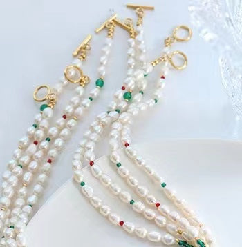 Collar de ojo verde de acero y titanio con perla de agua dulce genuina