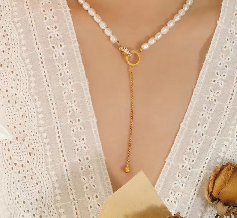Collar de acero y titanio con forma de círculo de la esperanza y perla de agua dulce auténtica