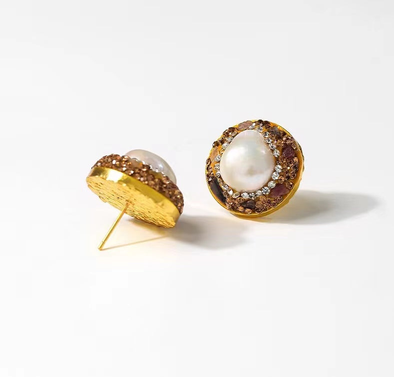 Boucles d'oreilles bouclier solaire en perles baroques véritables