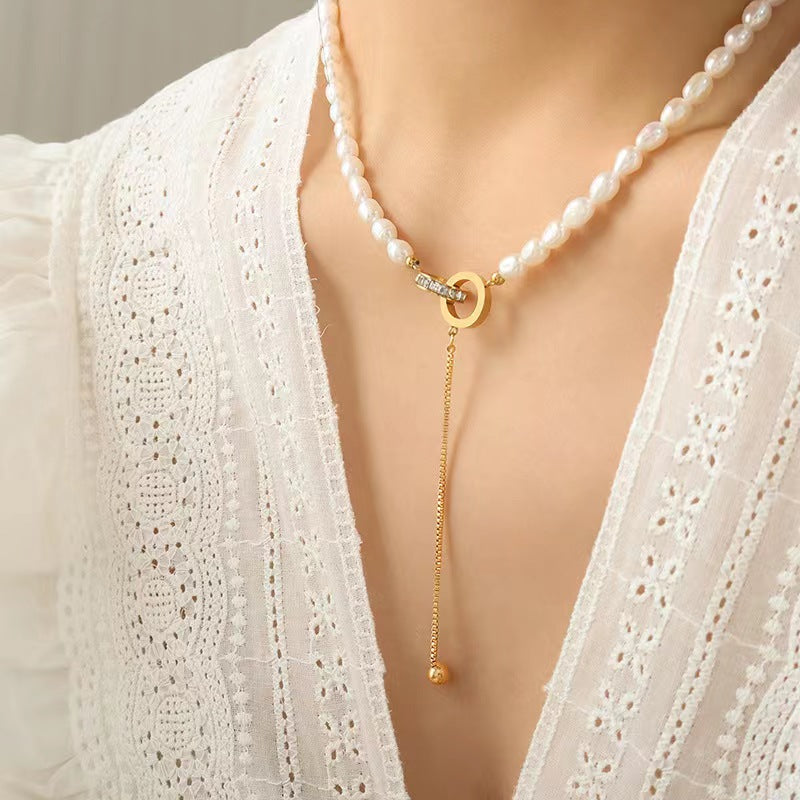 Collar de acero y titanio con forma de círculo de la esperanza y perla de agua dulce auténtica