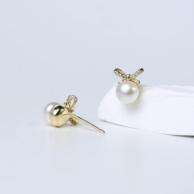 Boucles d'oreilles nœud papillon en perles d'eau douce véritables