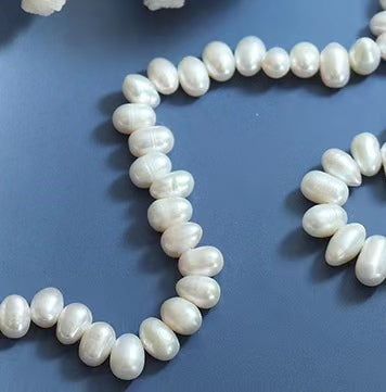 Collar de arroz de acero y titanio con perla de agua dulce genuina